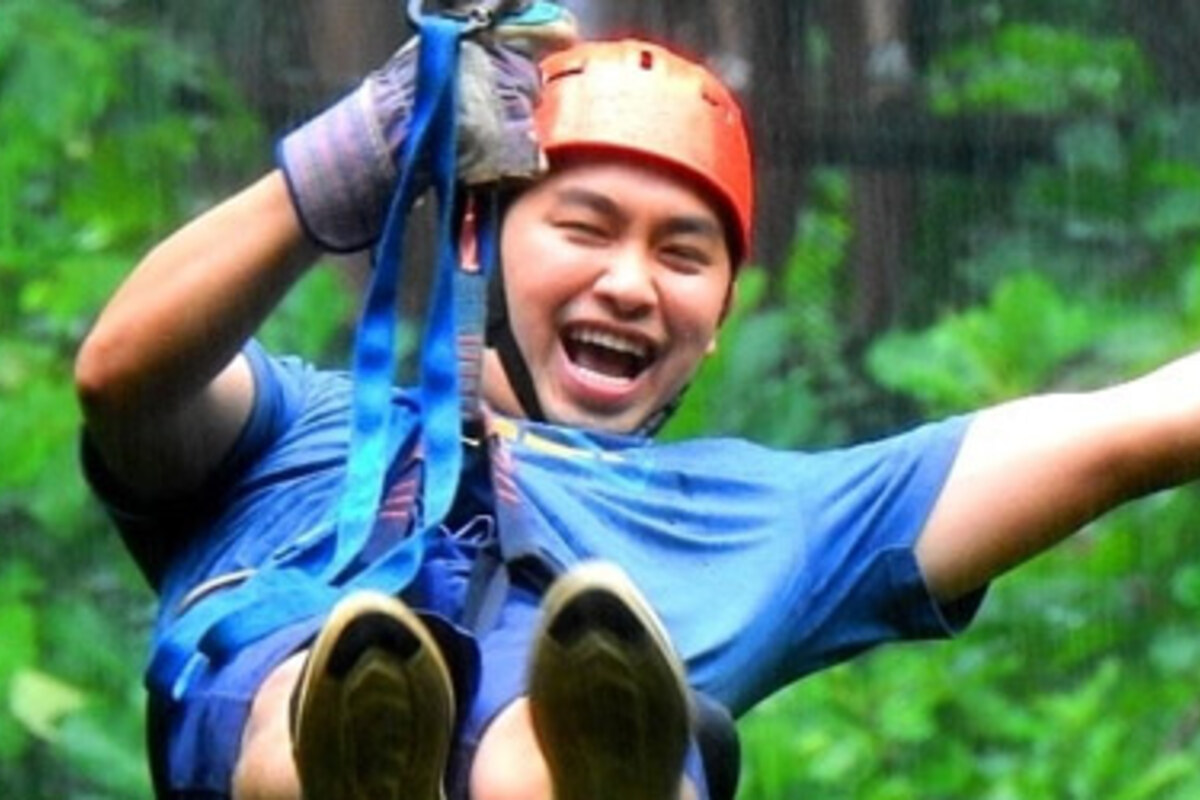 Traveler enjoying a zip-line adventure in Guanacaste